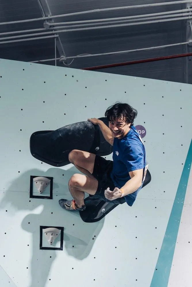 Bouldering competition male athlete