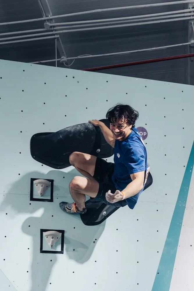 Bouldering competition male athlete