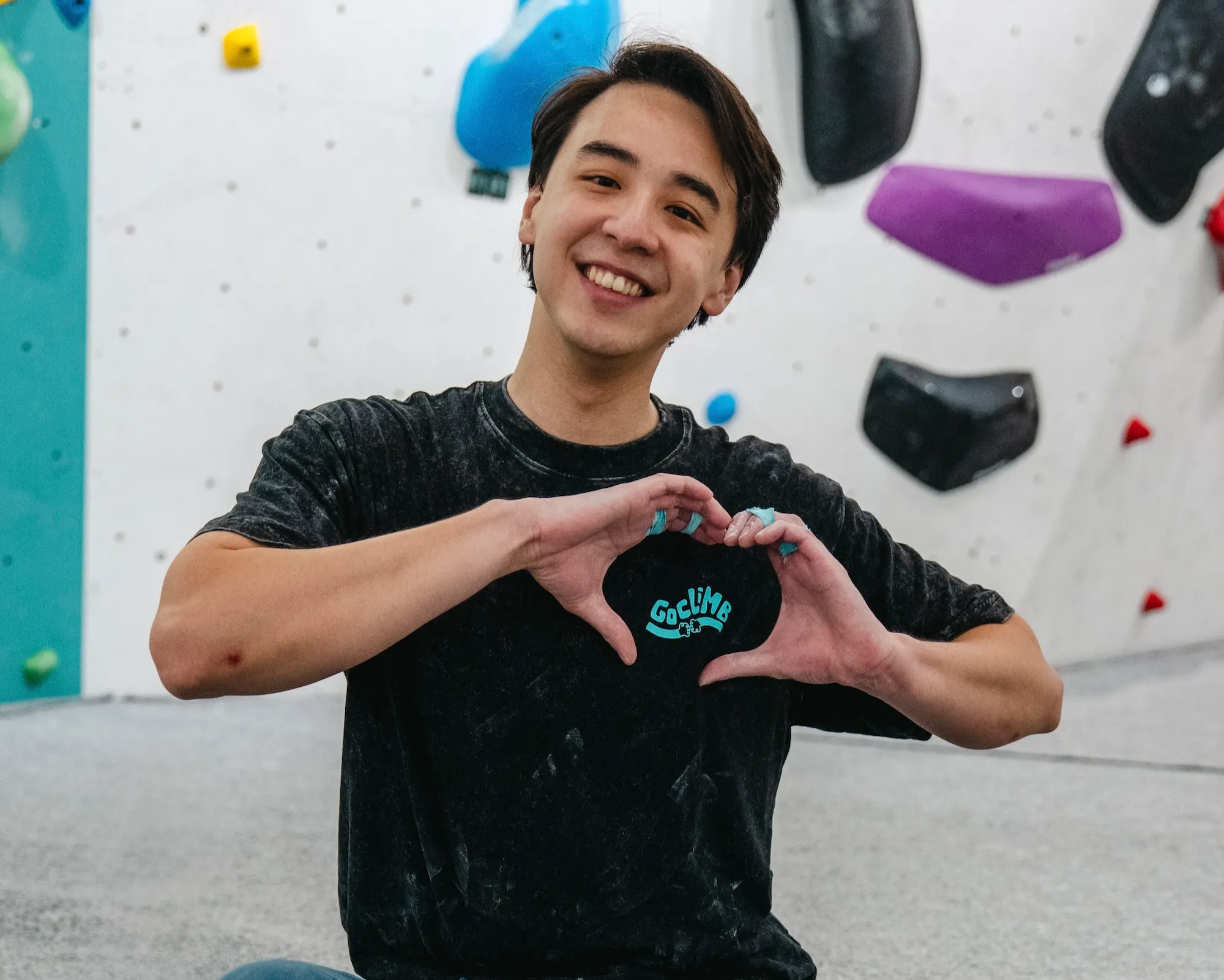 Climber celebrating at GoClimb's 1st anniversary