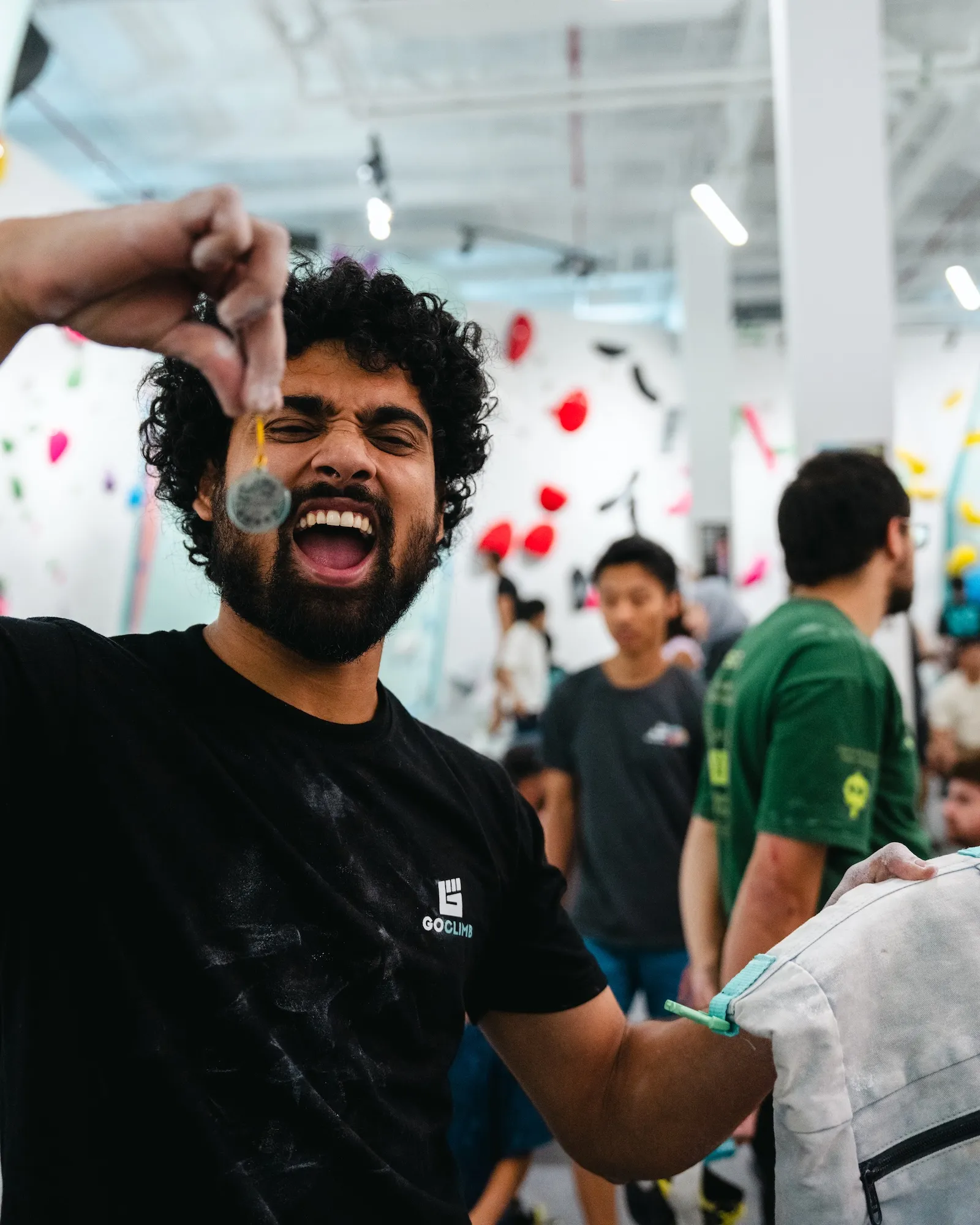 Climber celebrating his badge at GoClimb's 1st Anniversary