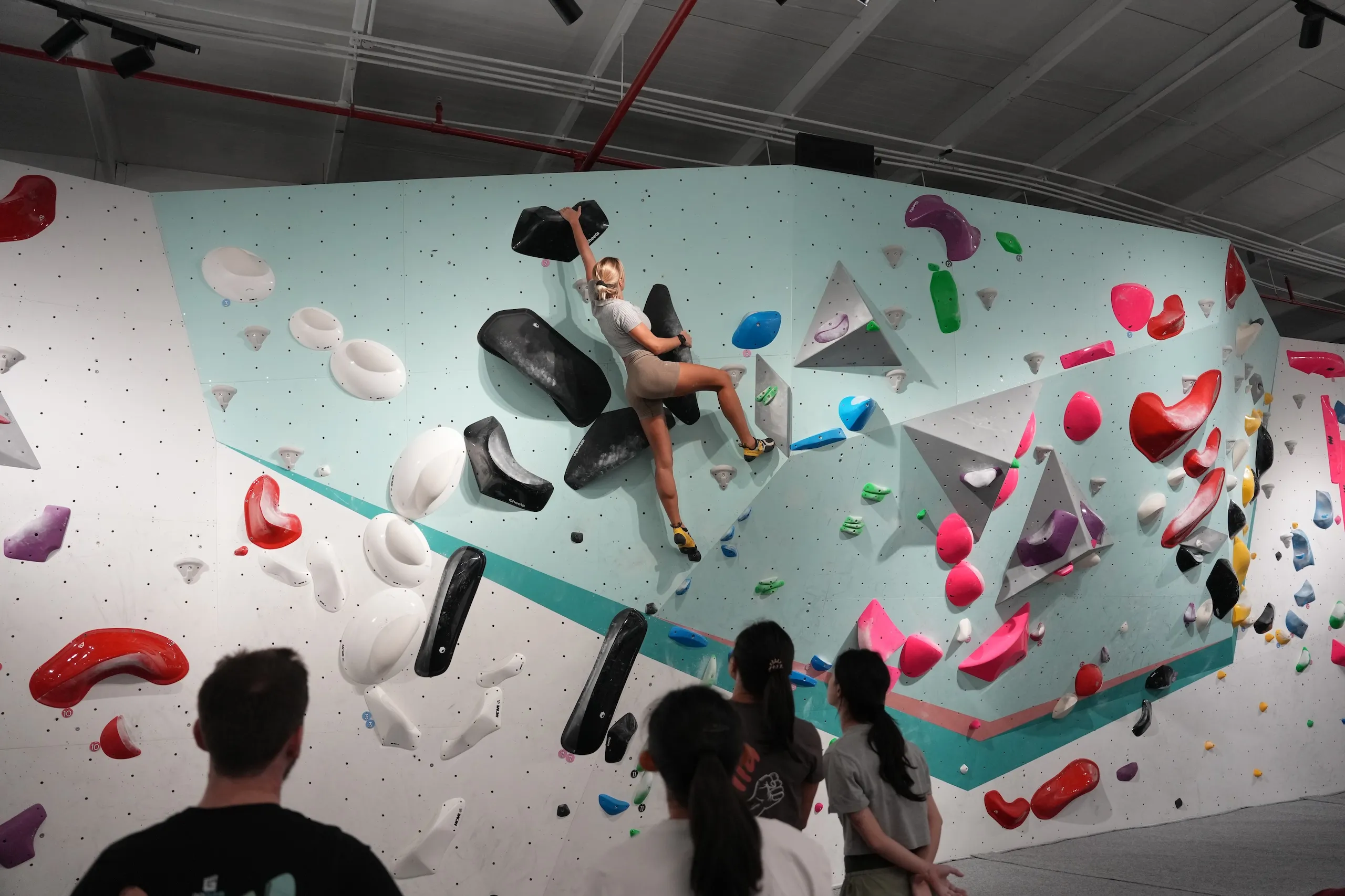 Climbers on the wall at GoClimb, Junction Mall Dubai
