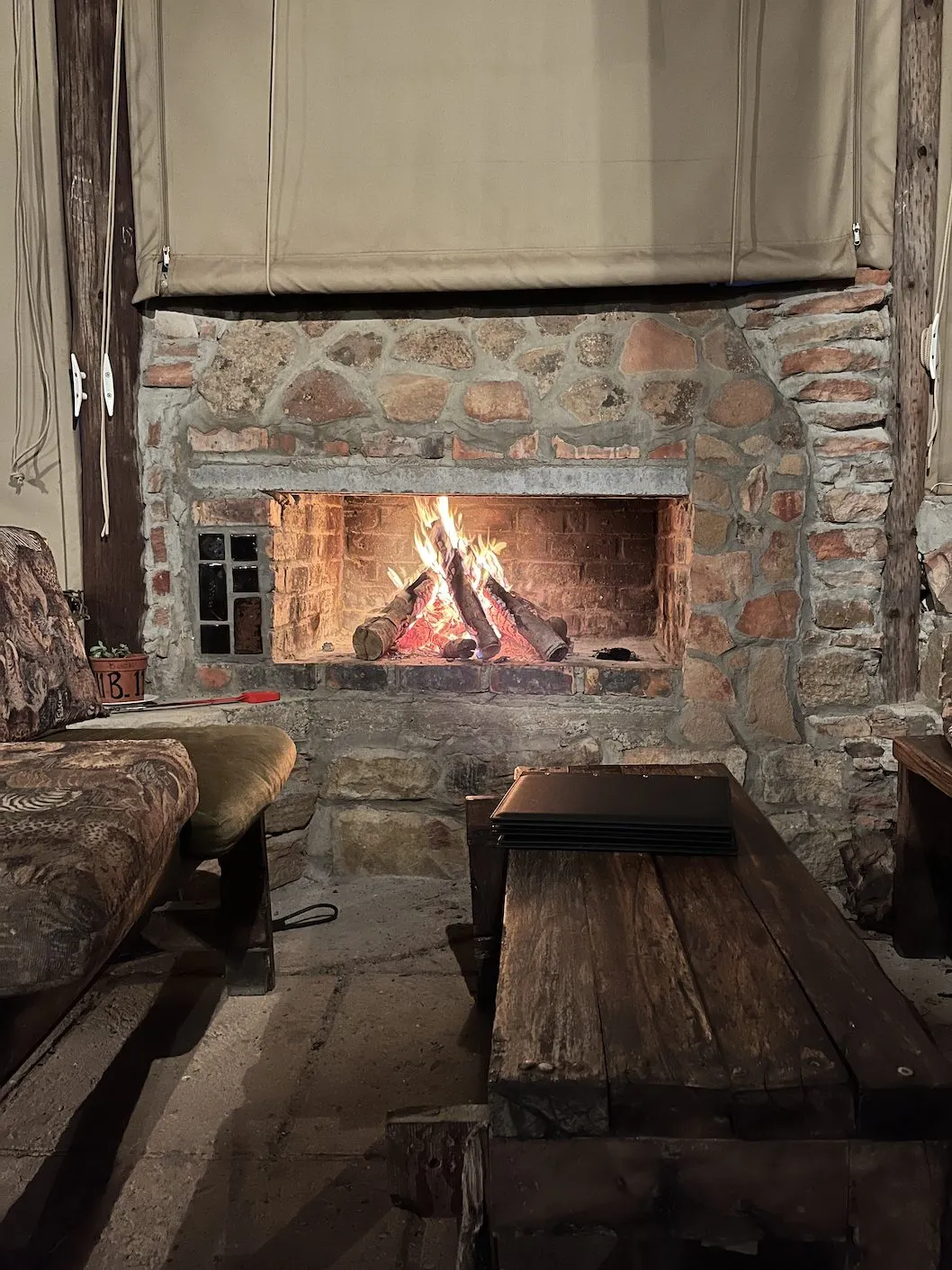 Warming by the fireplace at night